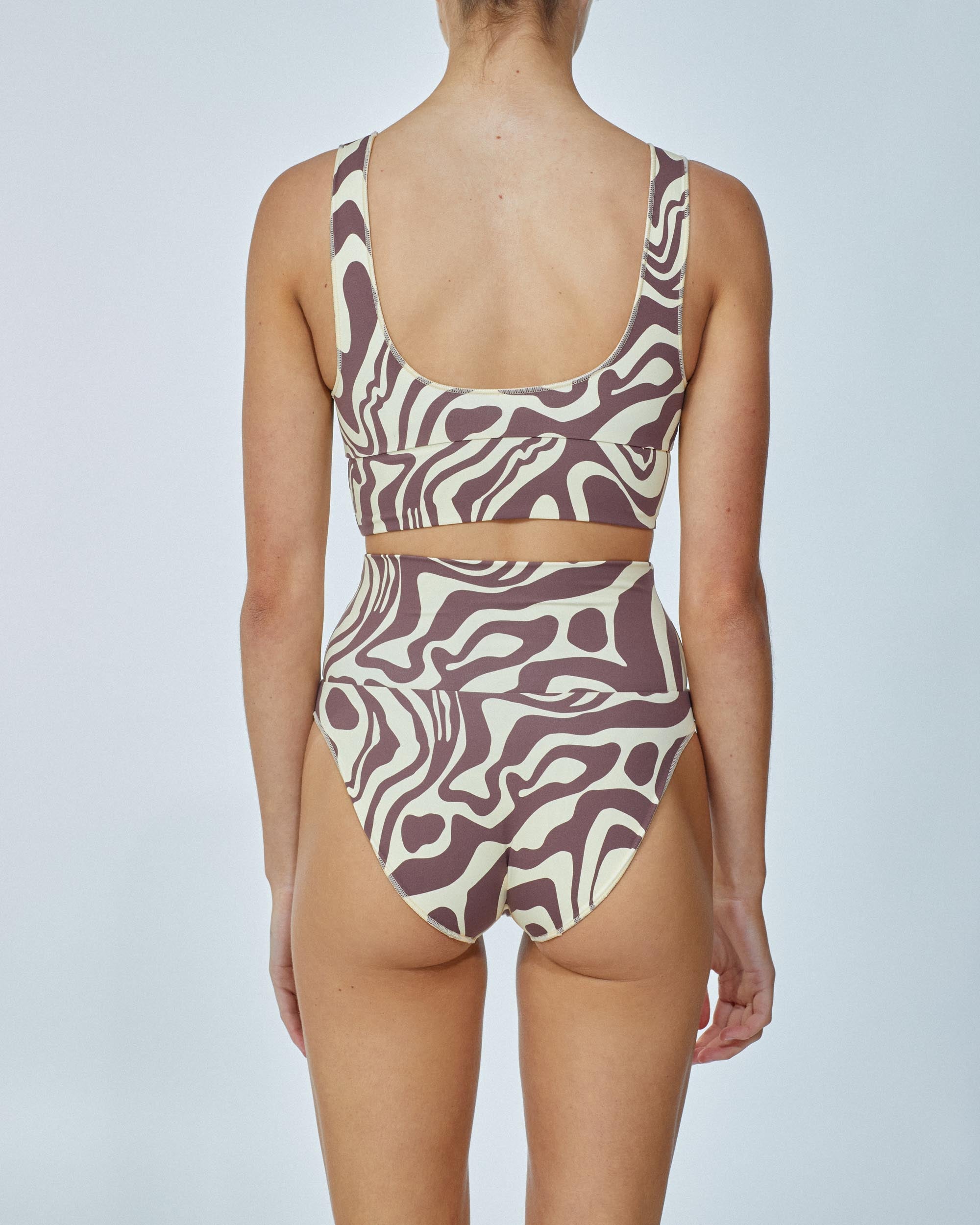 On body back of the Contour High Waist Pant - Capuccino.