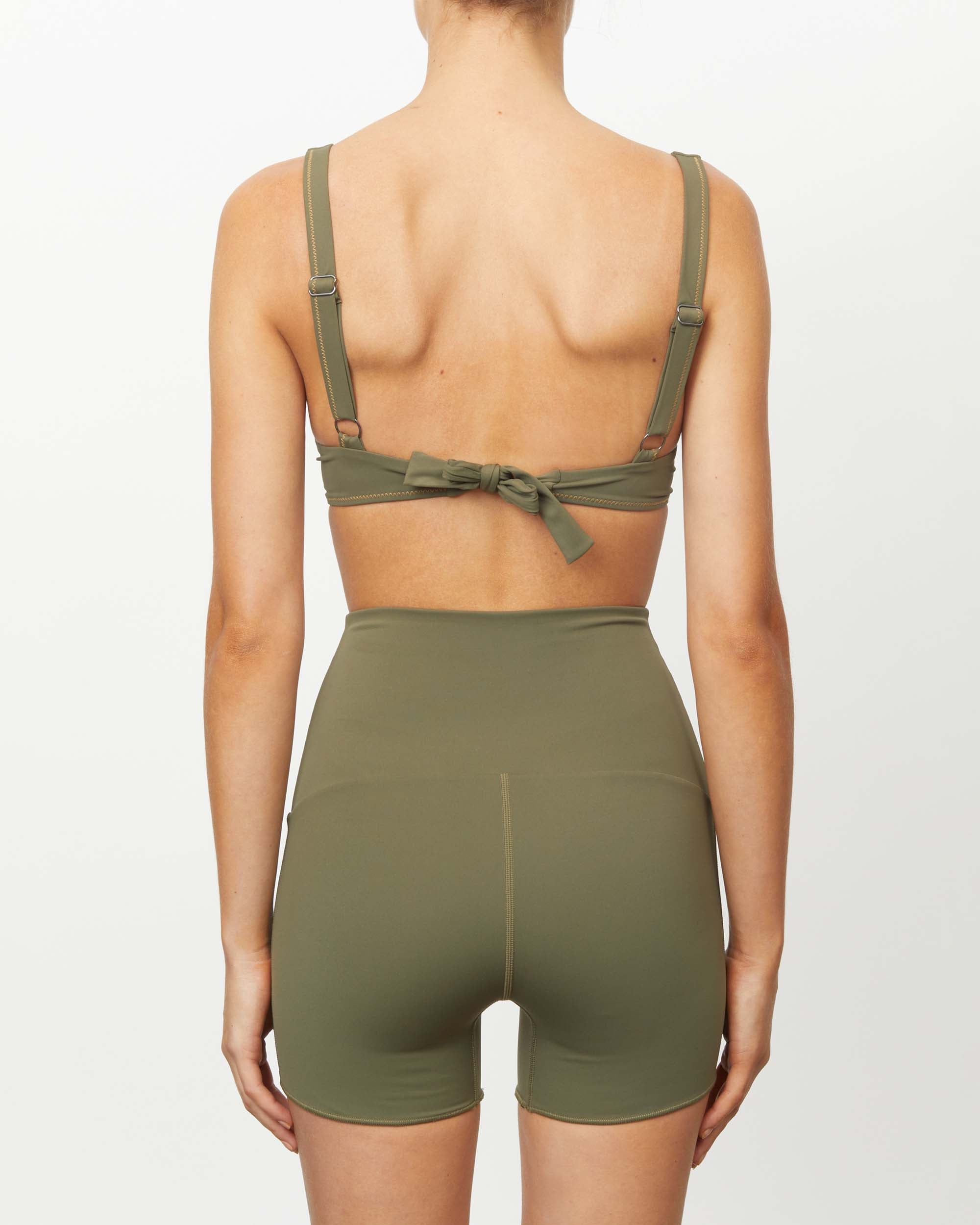 On body back of the THE CONTOUR BOOST TOP - CARRAWAY