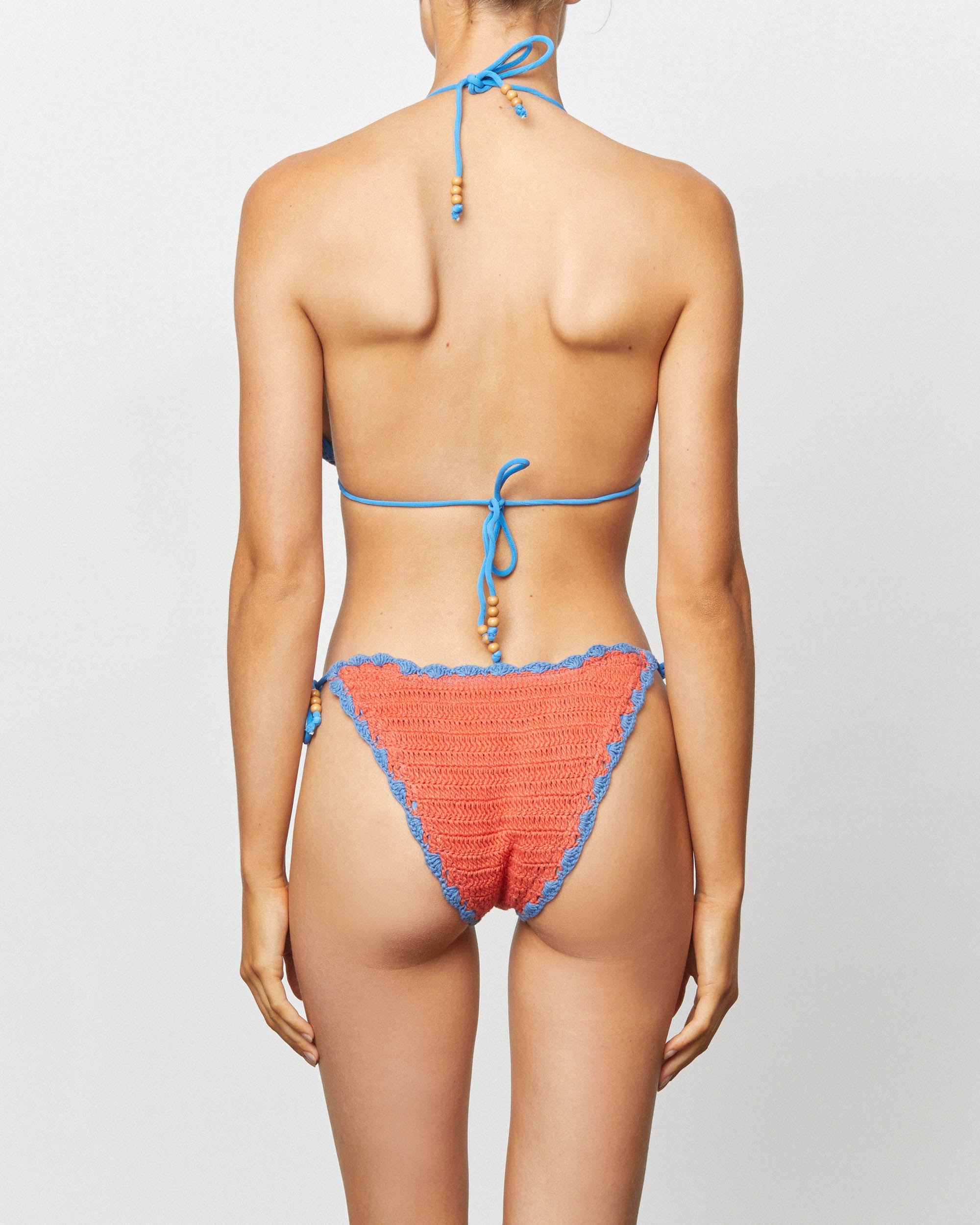 On body back of the Crochet Tie Pant - Cherry.