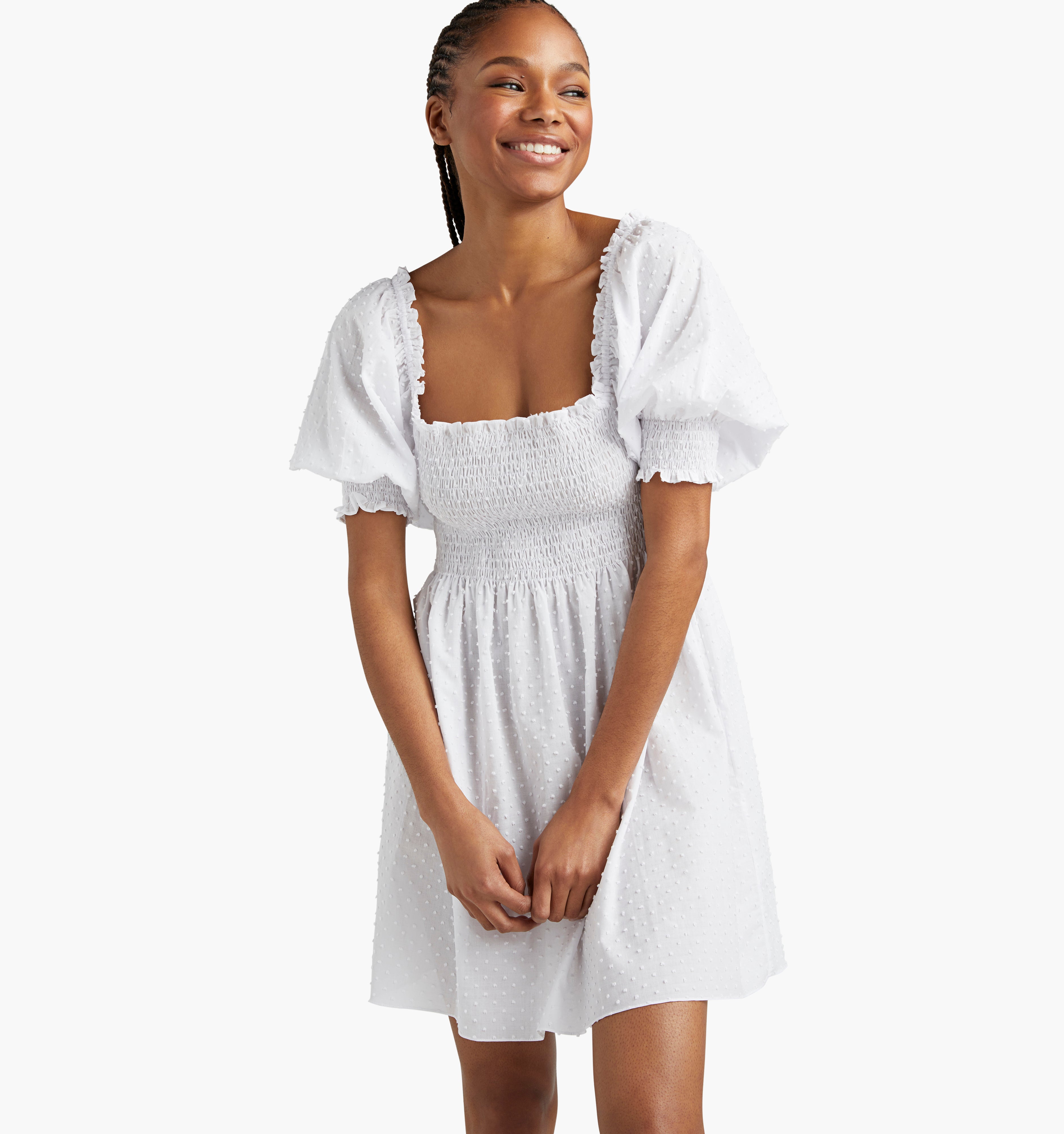 Na’Jeen is 5'9" and wears a size XS in the Sheer White Swiss Dot color:Sheer White Swiss Dot