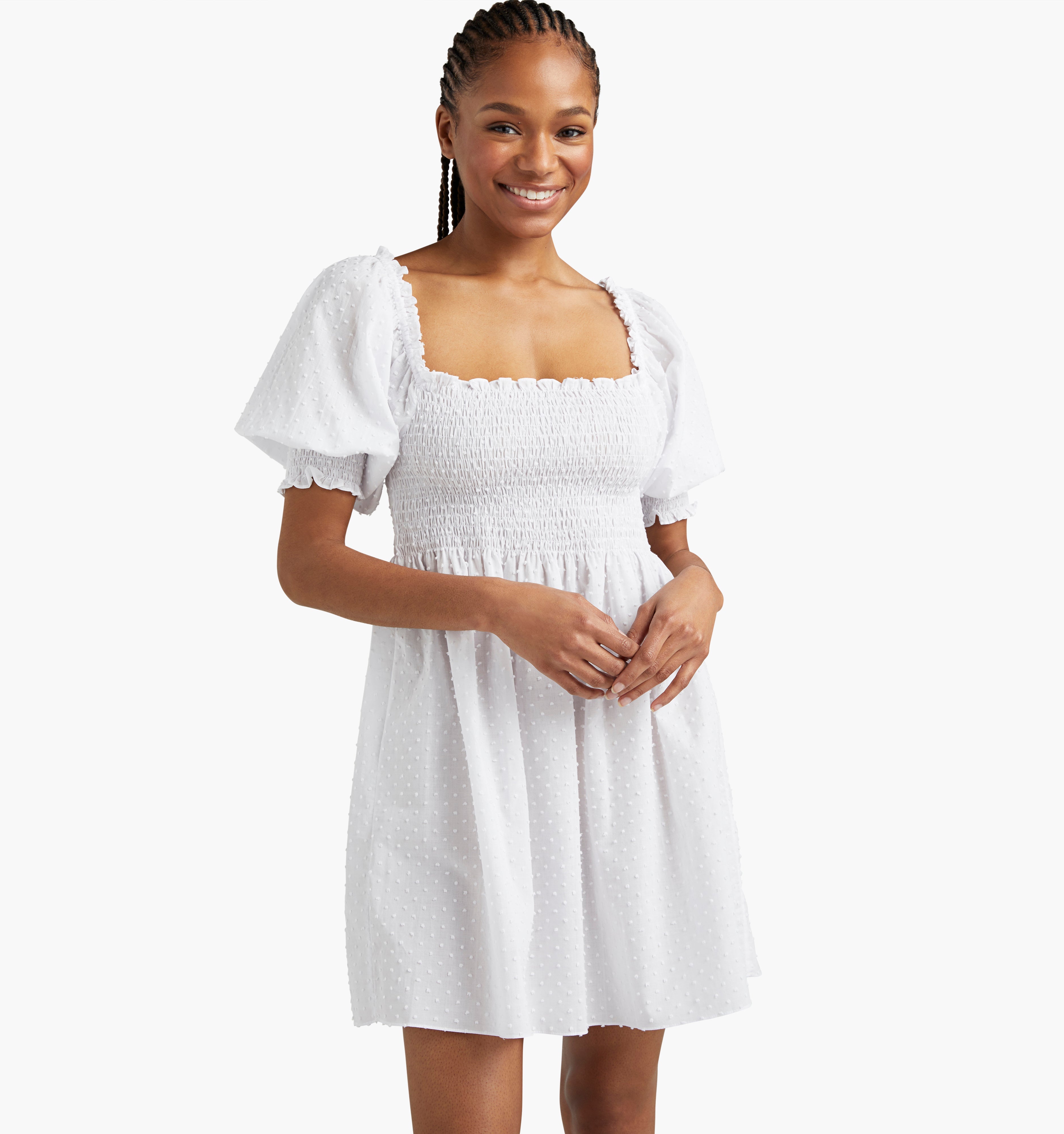Na’Jeen is 5'9" and wears a size XS in the Sheer White Swiss Dot color:Sheer White Swiss Dot