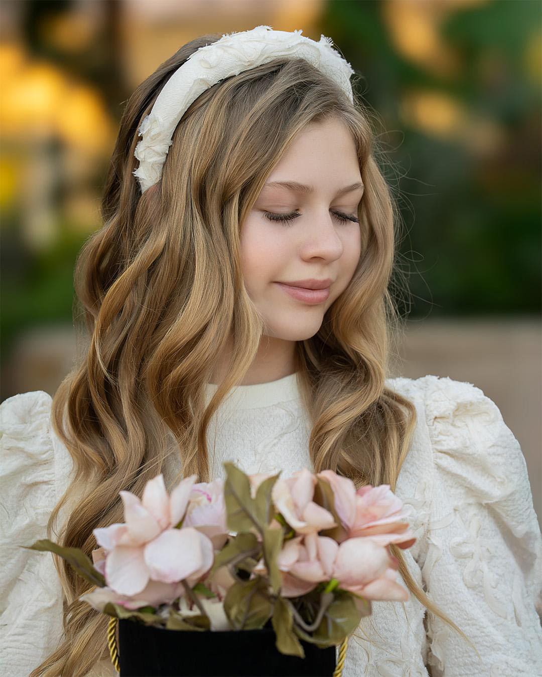 ivory textured headband with floral detailing. perfect to pair with any piece from the Ava collection