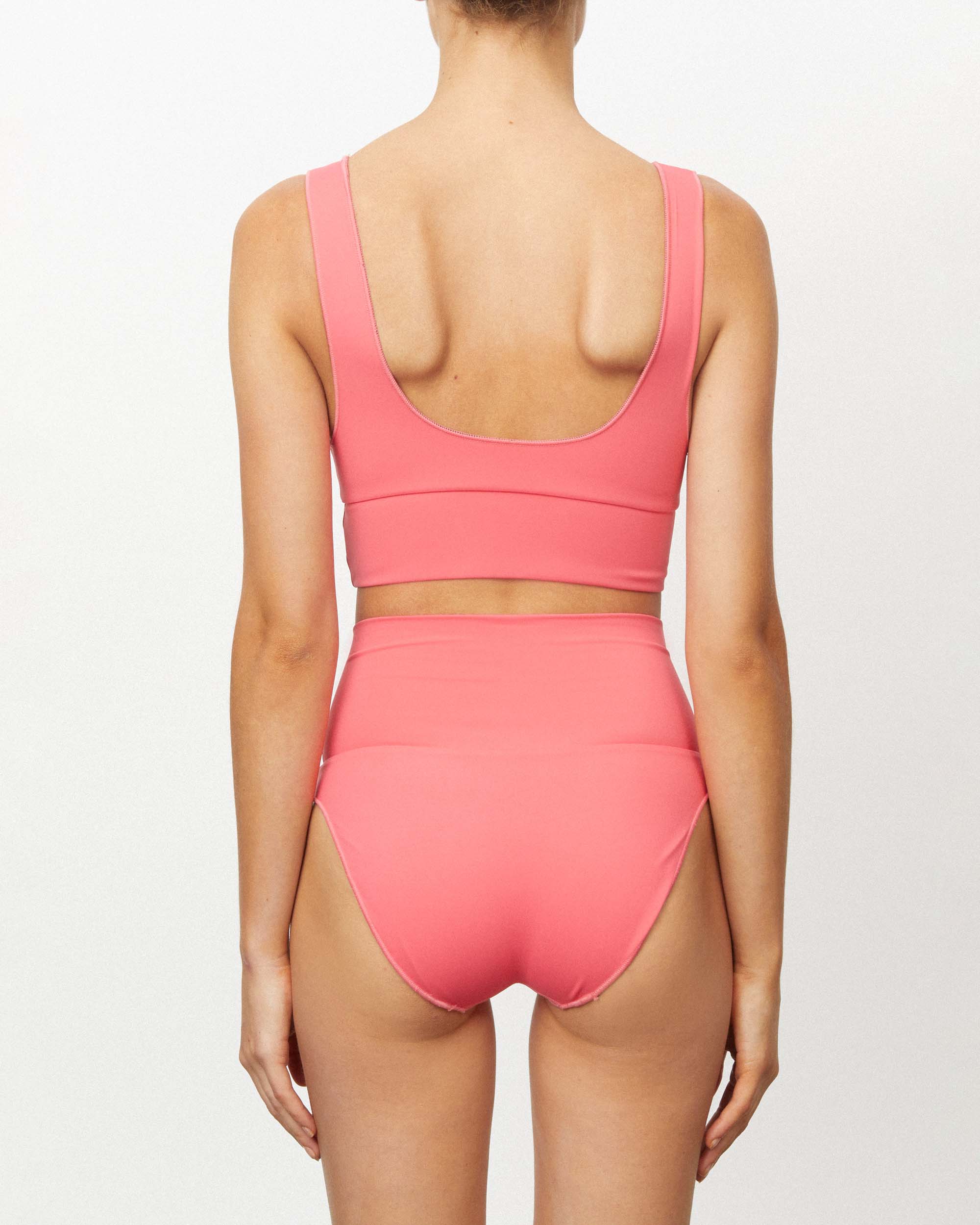 On body back of the Contour High Waist Pant - Calypso. 