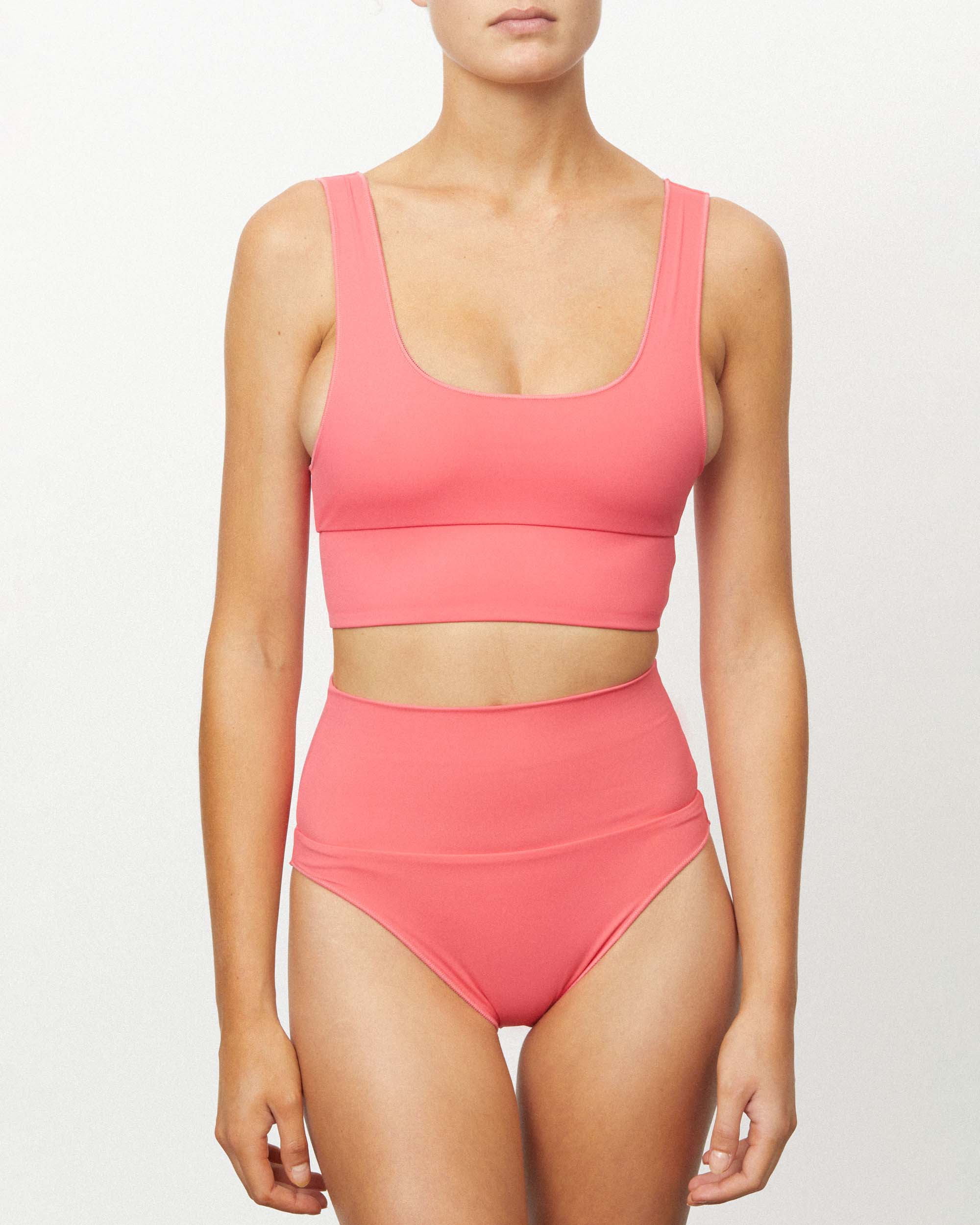 On body front of the Contour High Waist Pant - Calypso. 