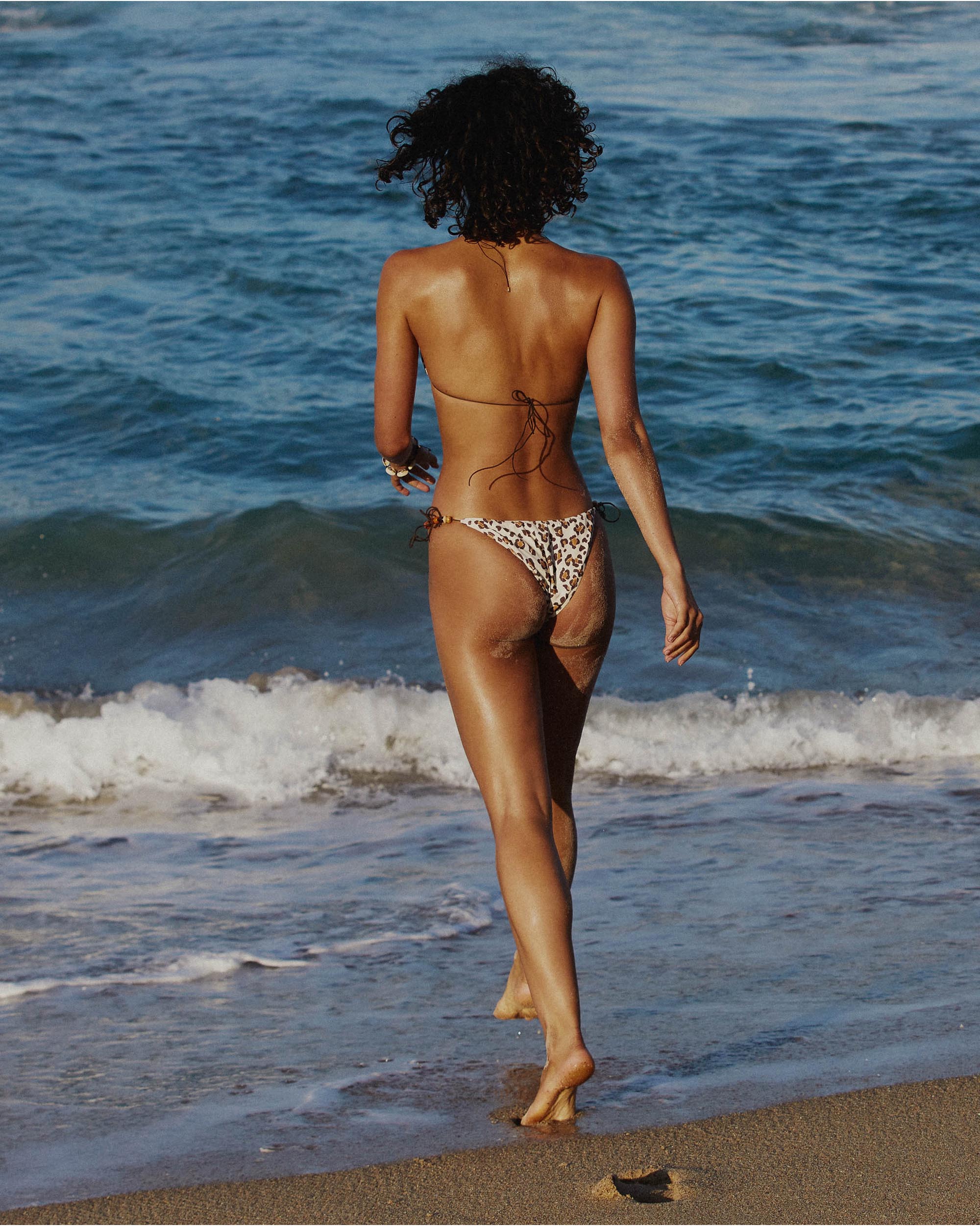 Lifestyle photo of the 90s Tie Pant - Cheetah.