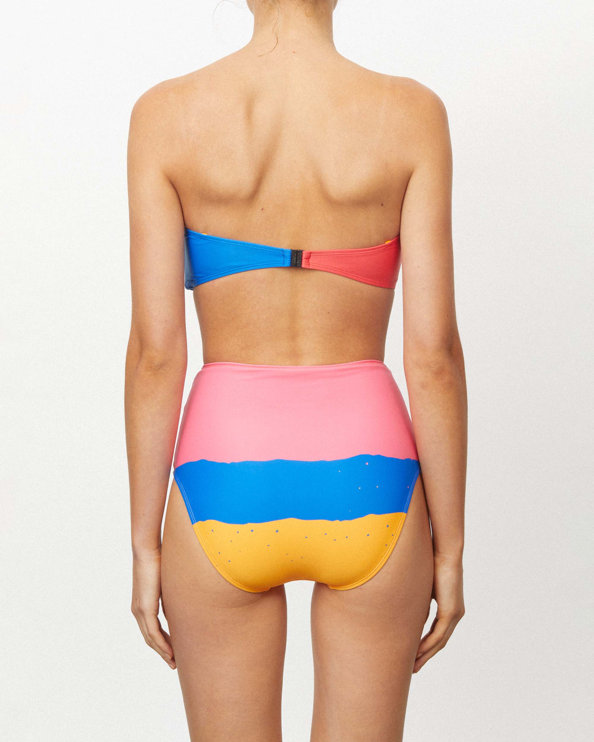 Studio image of the High Waist Pant in Oceano, showcasing its high-waisted fit and moderate bottom coverage.  