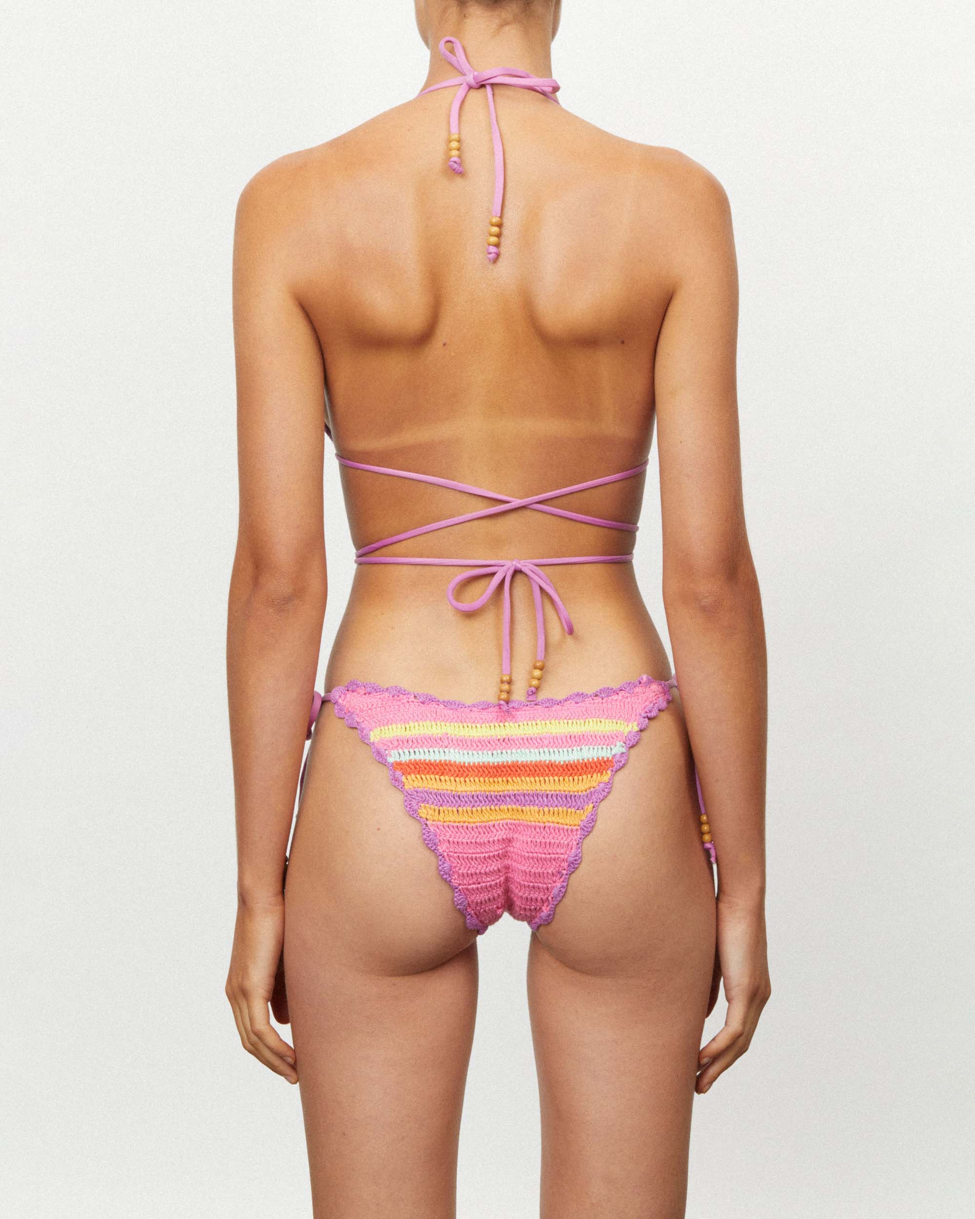On body back of the Crochet Tie Pant - Vida. 