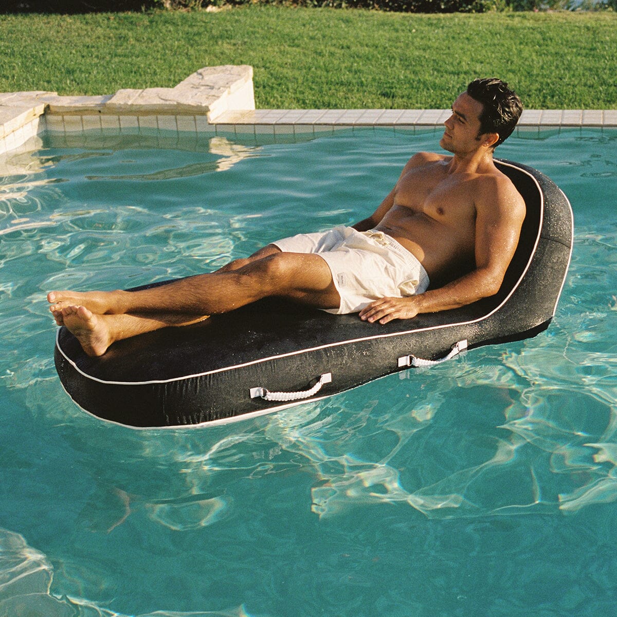 The Pool Lounger - Rivie Black Pool Lounger Business & Pleasure Co. 