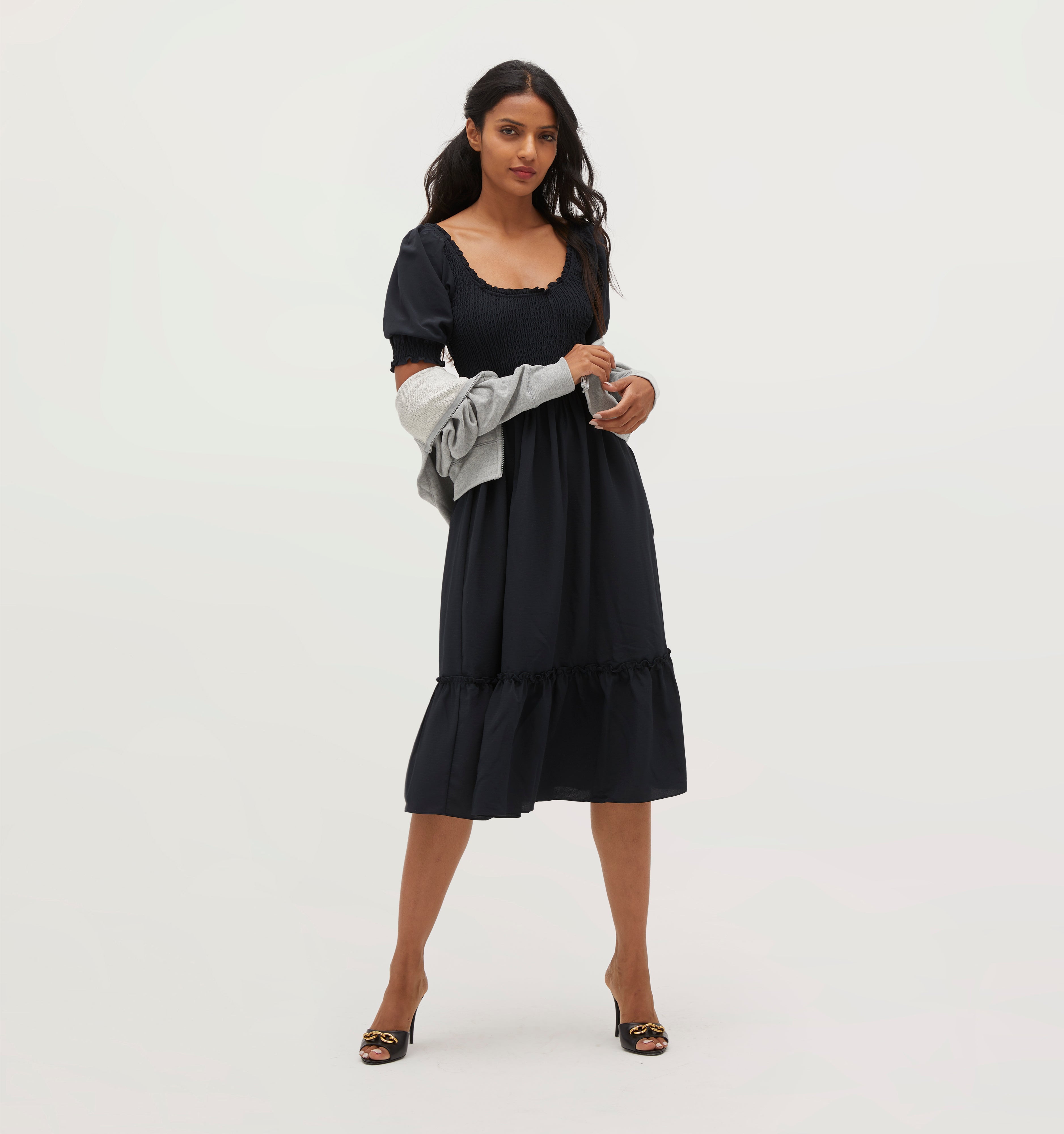 Palak wears a size XS in Black Crepe color: Wrinkle Resistant Black Crepe