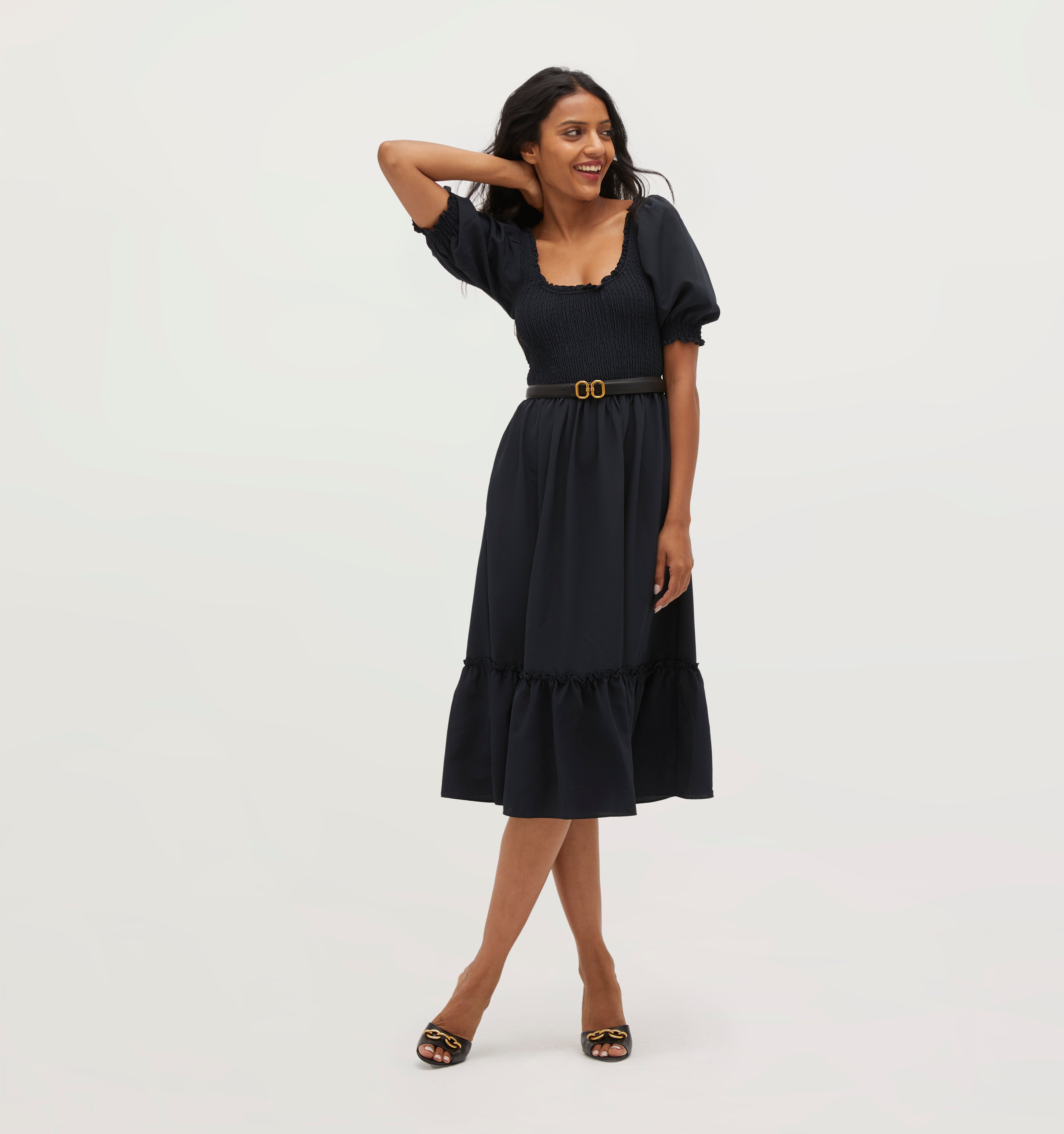 Palak wears a size XS in Black Crepe color: Wrinkle Resistant Black Crepe