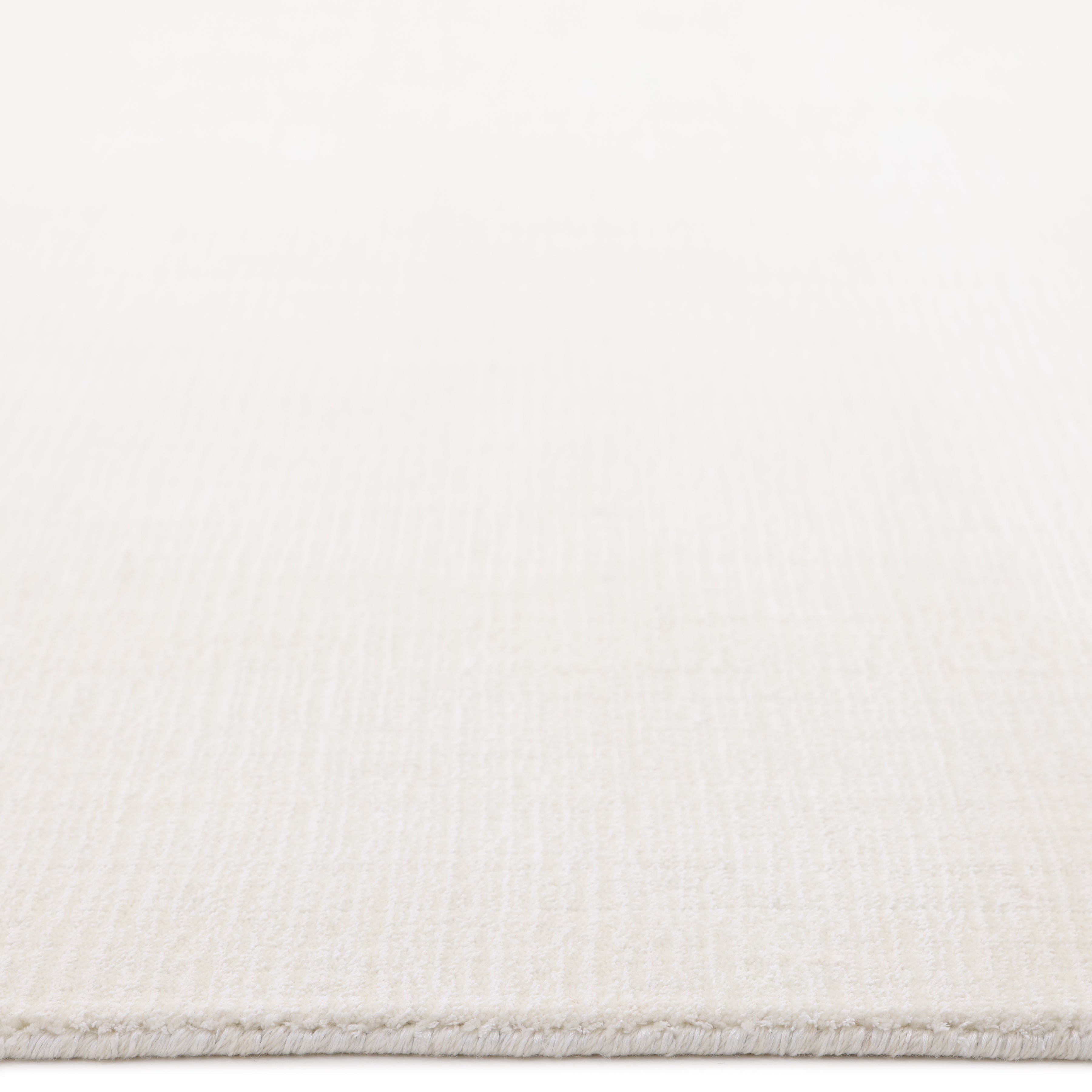 Lodhi Handmade Contemporary Solid Ivory Area Rug