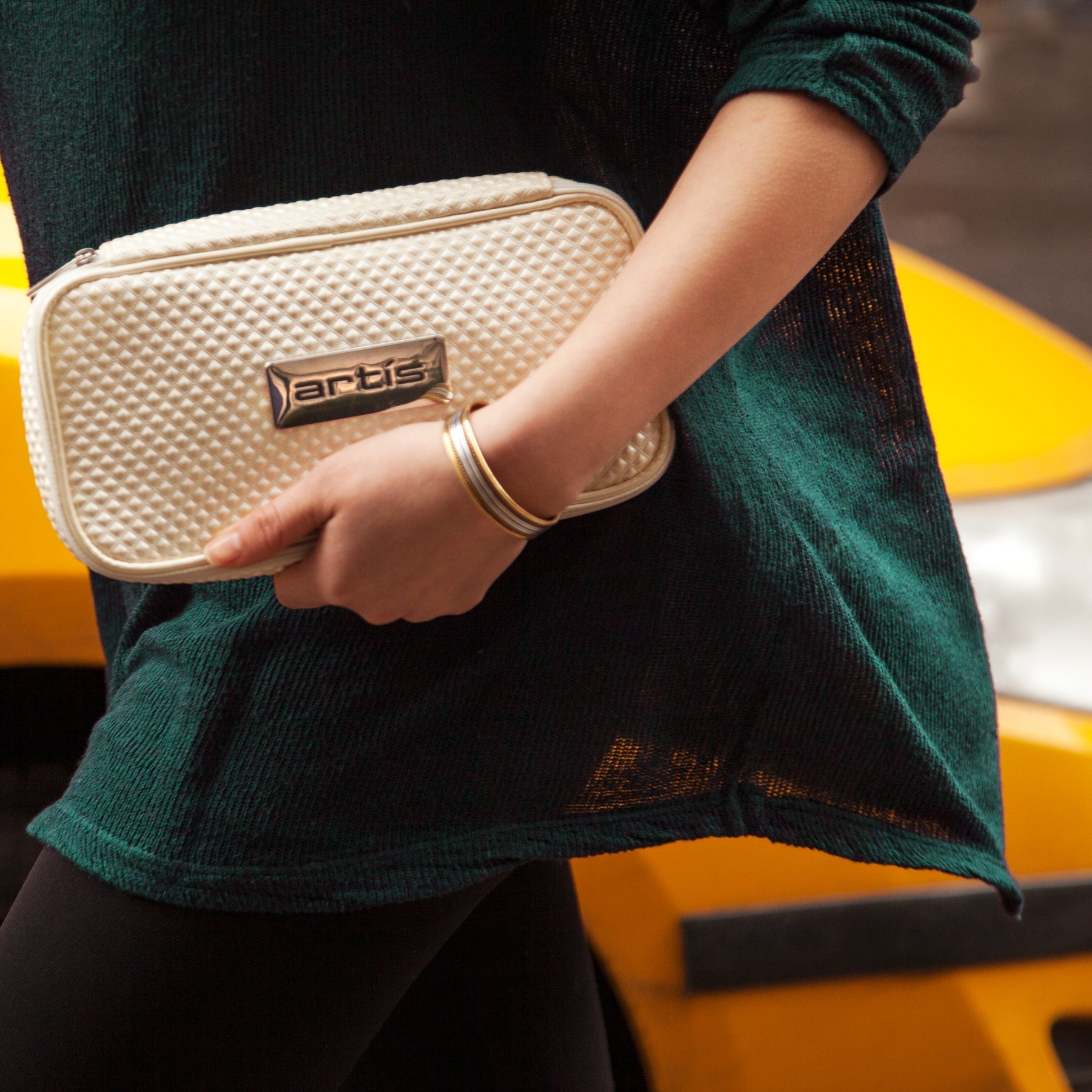 model holding travel case medium ivory