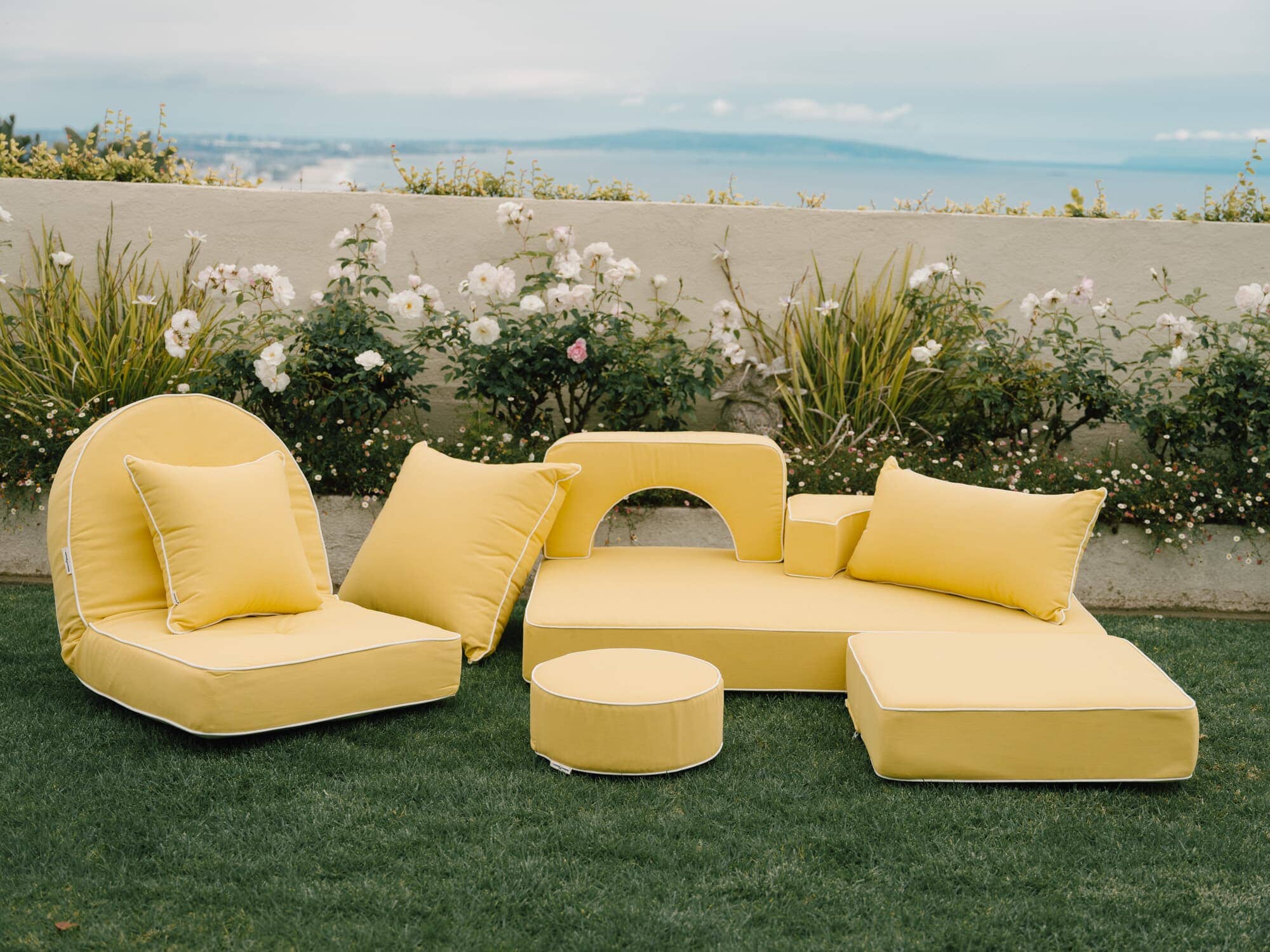 Colored outdoor cushions on grass