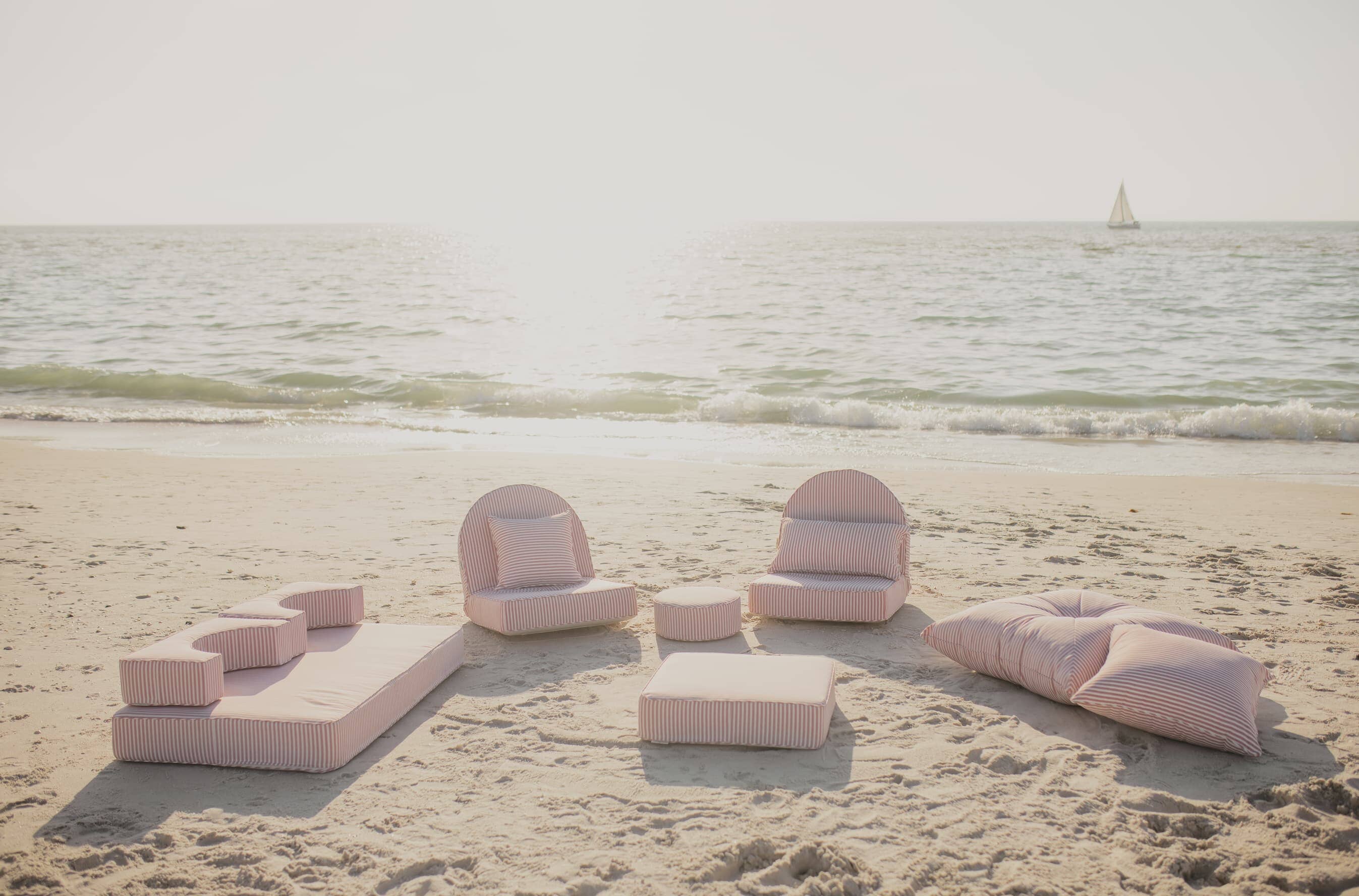 beach picnic with pink stripe modular pillow stack