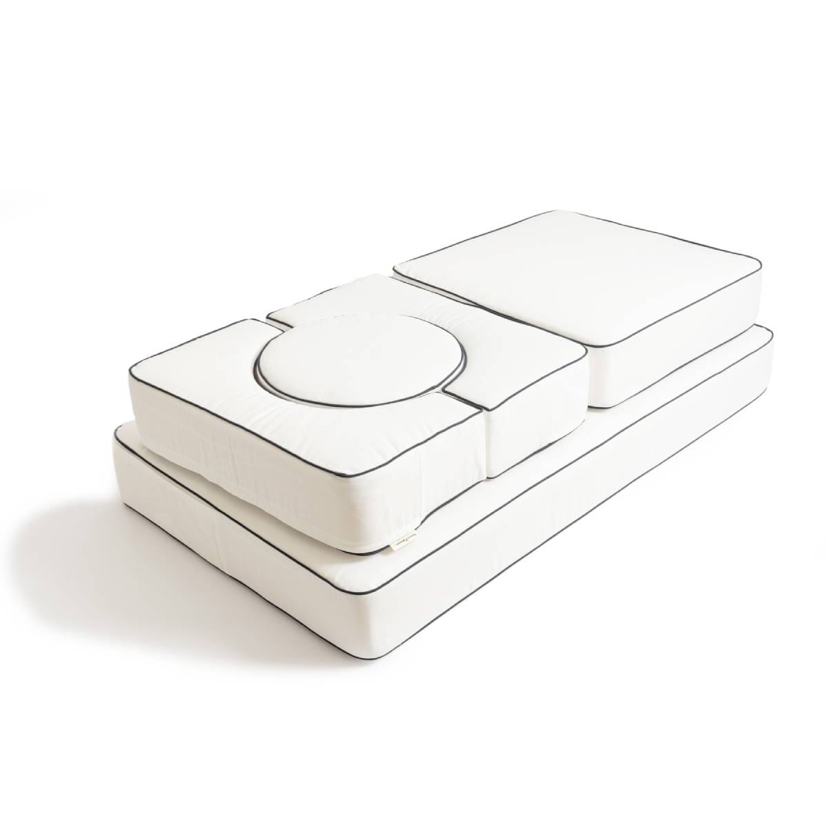 studio image of white modular pillow stack