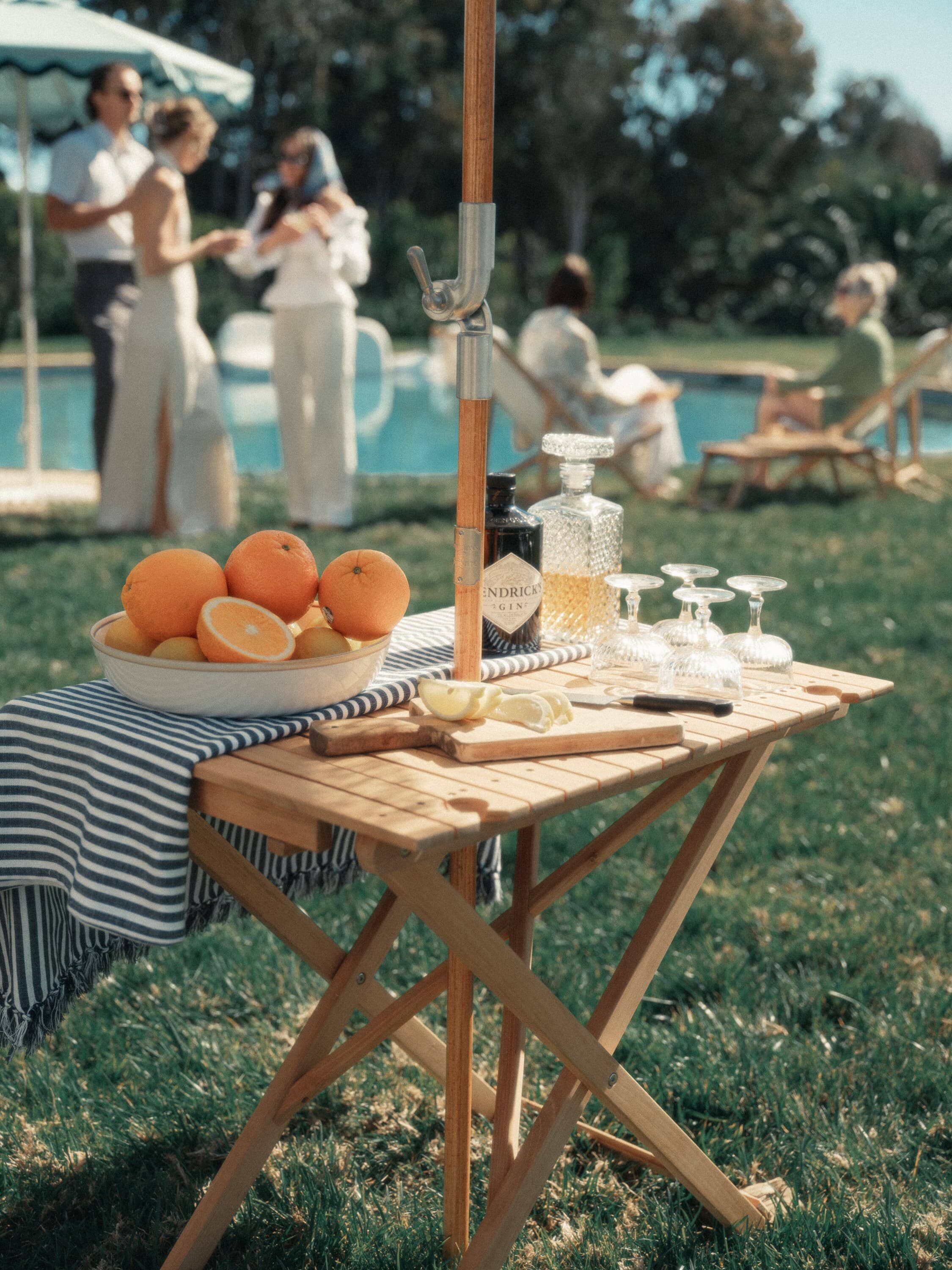 outdoor table setting with navy tablecloth